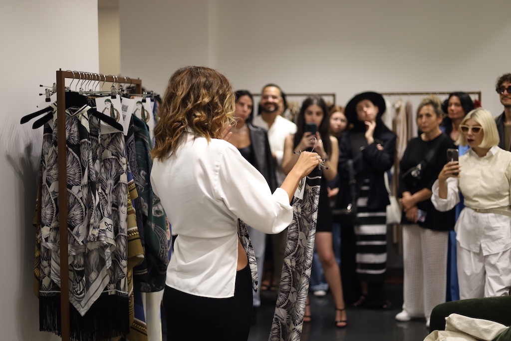 designer showcasing her collection during fino consulting event
